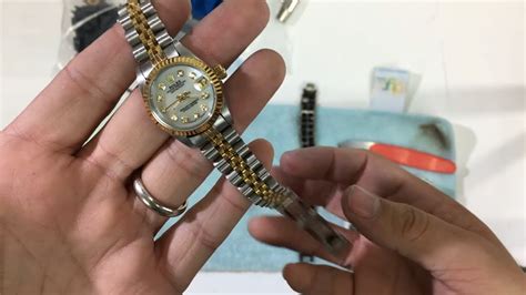 how to open a fake rolex